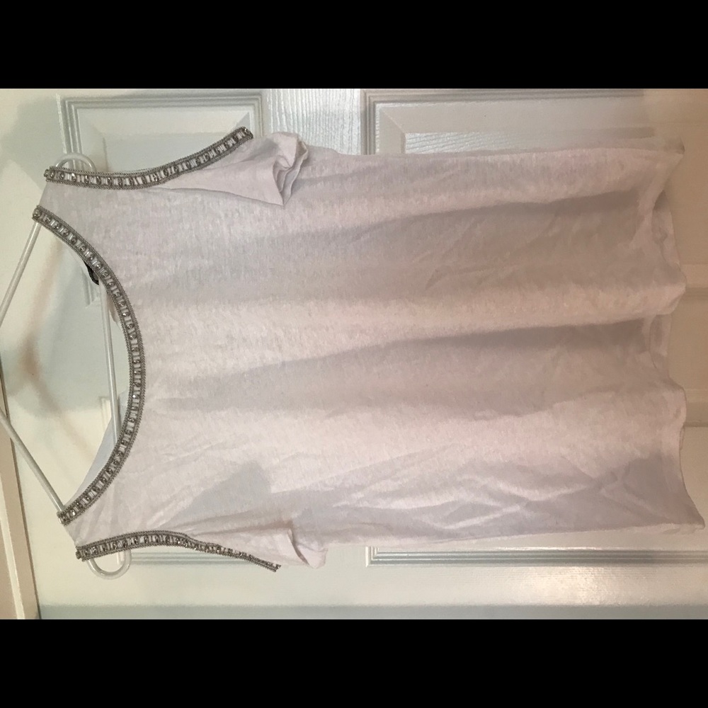 White top/shirt with beads on the neck line